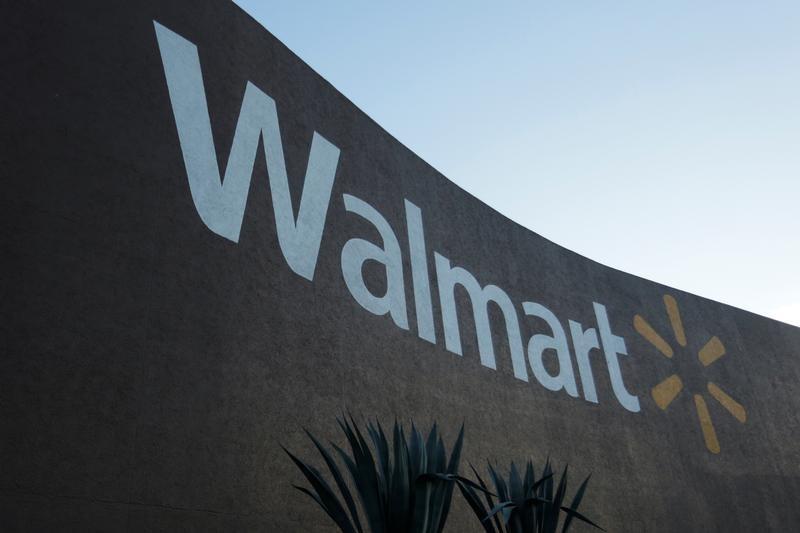 Wal Mart triples online items lowers prices as holiday season kicks in