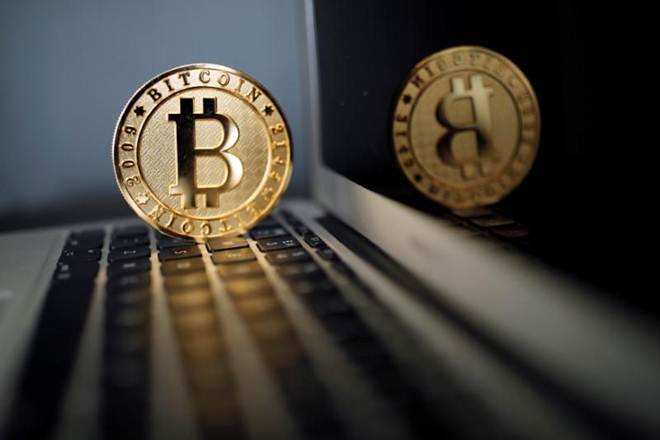 Bitcoin falls 30 percent, posts worst week since 2013