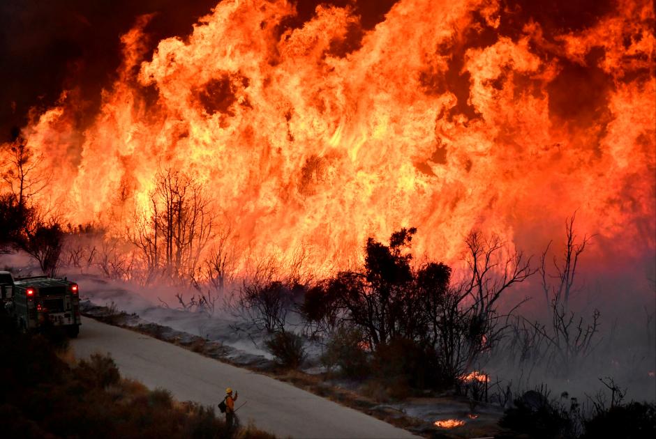 Firefighters hold back massive Southern California wildfire