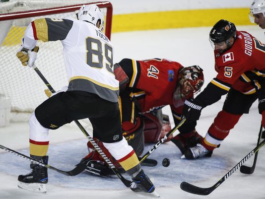 Marchessault keys late flurry as Knights stun Flames 4-2