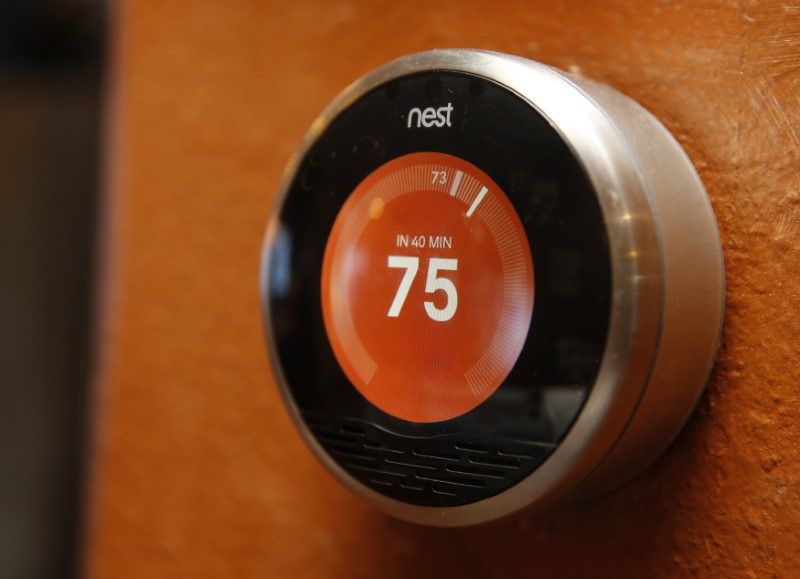 Alphabet shifts thermostat maker Nest into Google