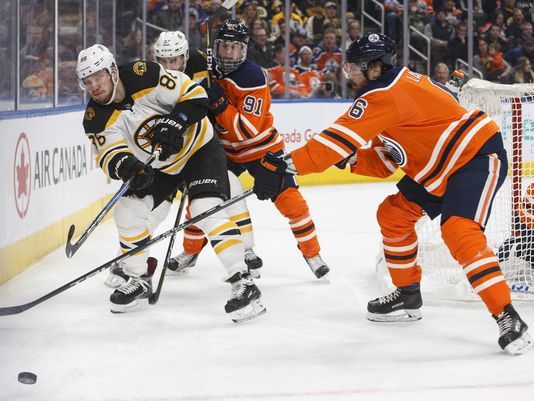 Krejci snaps tie late in 3rd, Bruins rally past Oilers 3-2