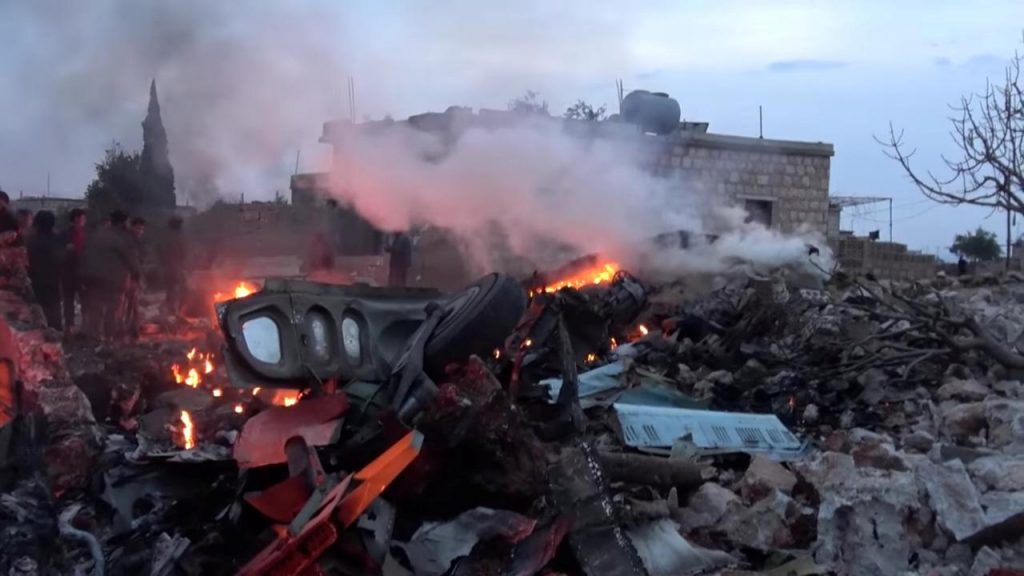 The scene shows, what according to Syrian rebels were fires caused by Russian military plane shot down by rebel forces near Idlib