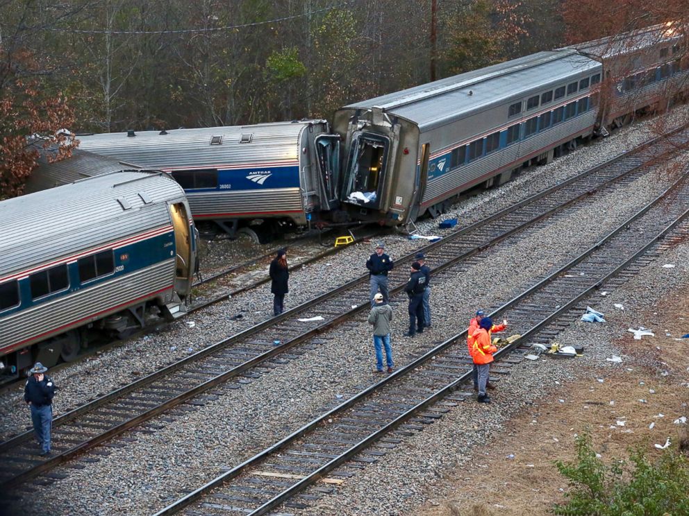 Amtrak train on wrong track in crash that killed 2, but it says freight line controls signals