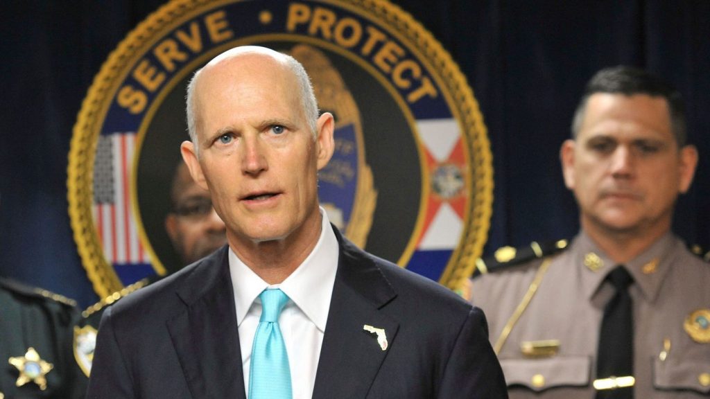 Bucking the NRA, Florida governor signs landmark gun control legislation