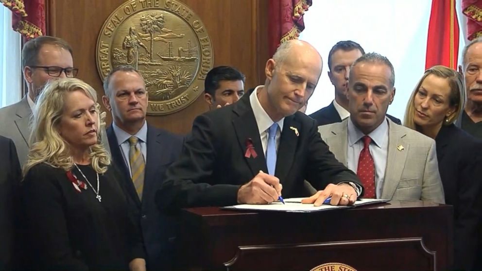 Florida Gov. Rick Scott signs gun bill