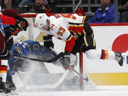 MacKinnon, Barrie helps Avs beat Flames 5-2