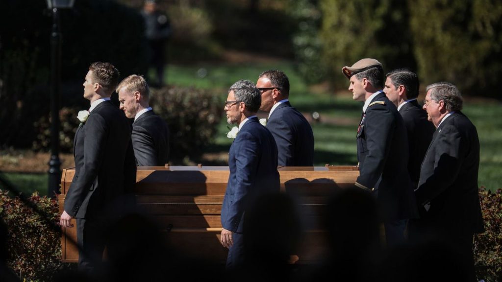 Trump and Pence among the thousands gathered to mourn Billy Graham