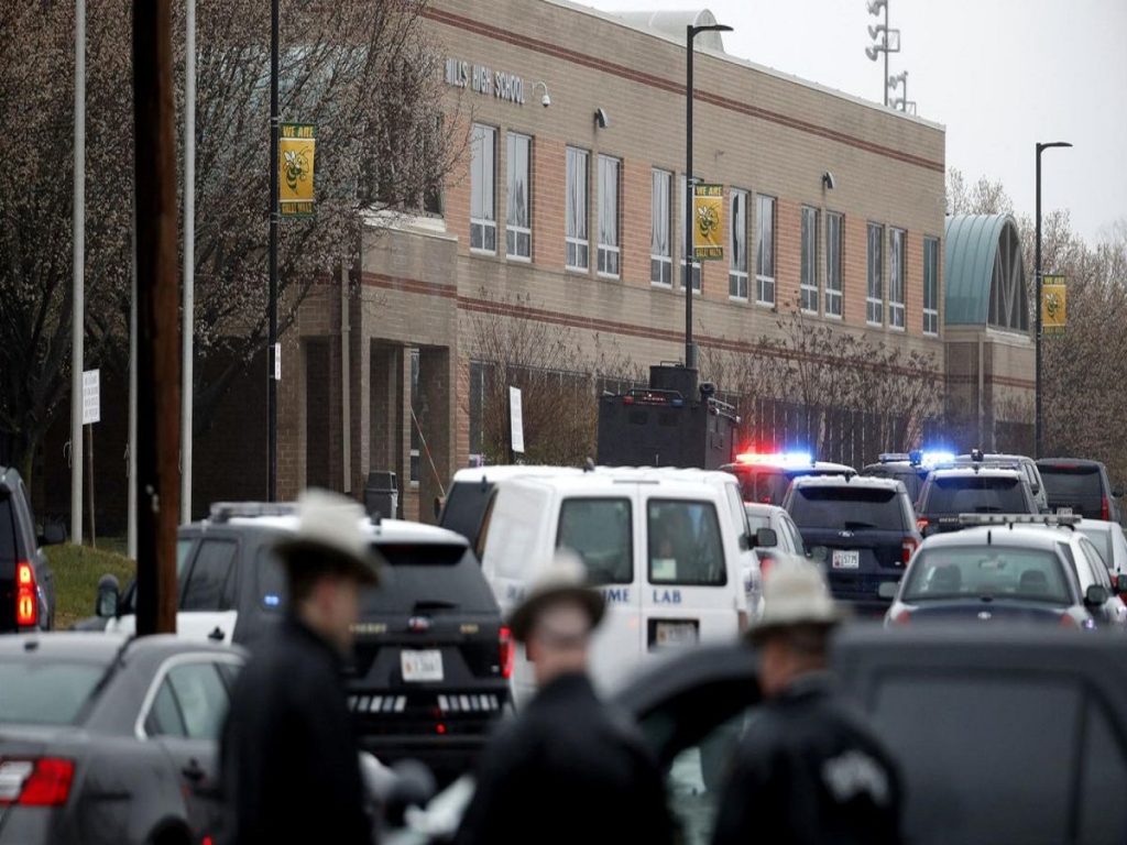 Student gunman wounds 2 in Maryland school attack, dies in clash with officer, officials say