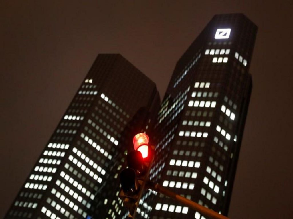 Deutsche Bank scales back investment bank as profit drops