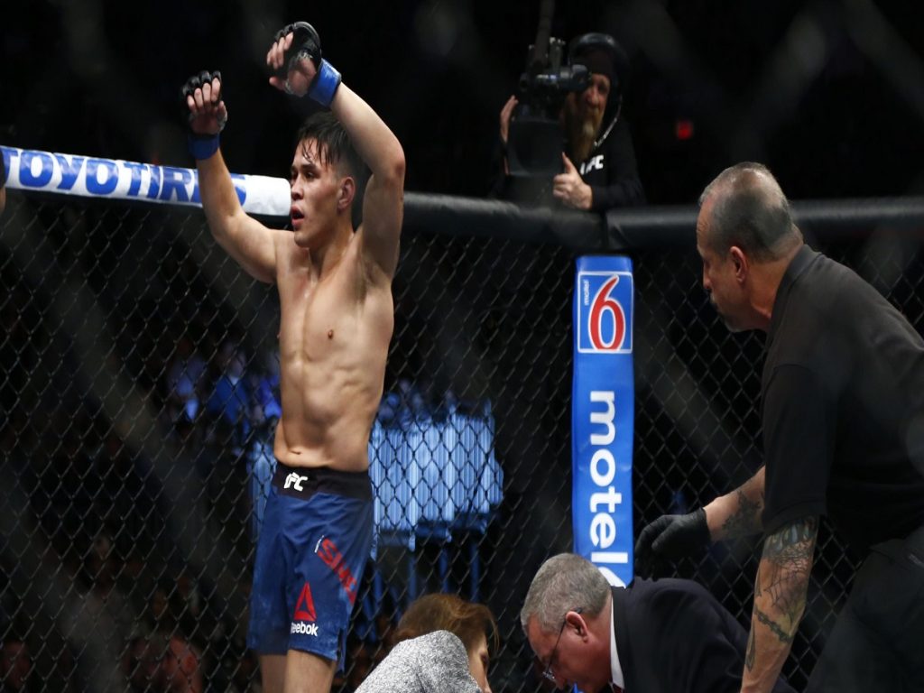 Fighter Ricky Simon wins by TKO after final bell at UFC Fight Night 128