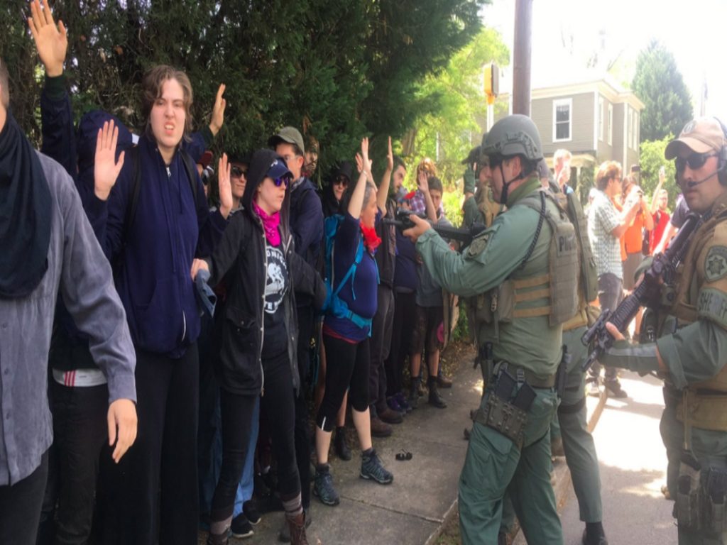 Militarized Cops At Tiny Georgia Neo Nazi Rally Arrest Counterprotesters For Wearing Masks