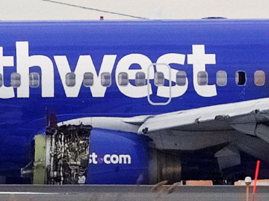 One dead after engine explodes midair on Southwest flight