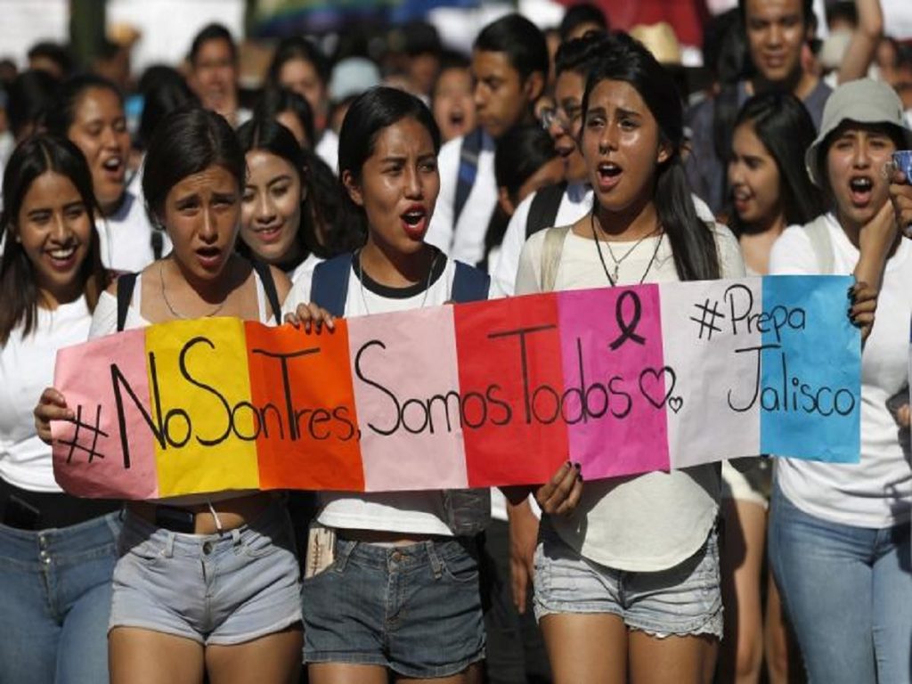 Thousands rally against drug cartel violence in Mexico following film students’ deaths