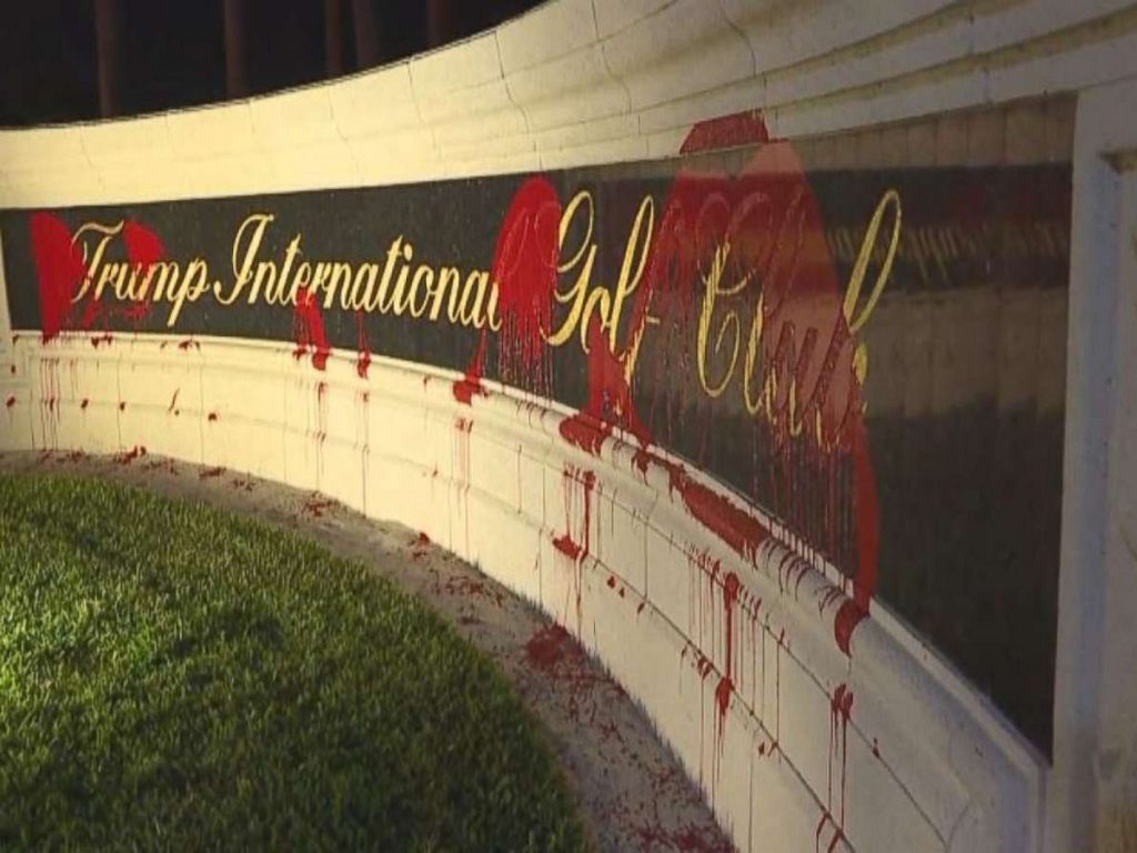 Trump International Golf Club sign splattered with red paint by vandals