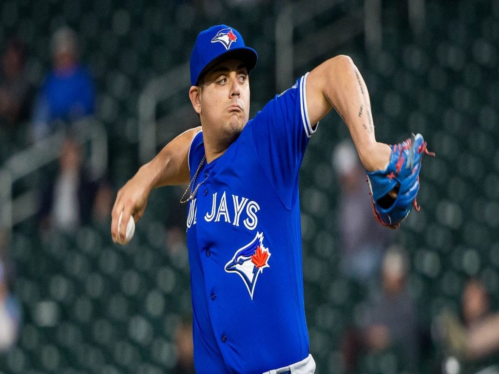 Blue Jays closer Roberto Osuna charged with assaulting woman; MLB places him on leave