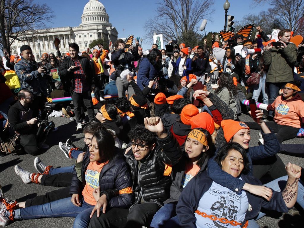 Texas, six other states sue Trump administration to force an end to DACA