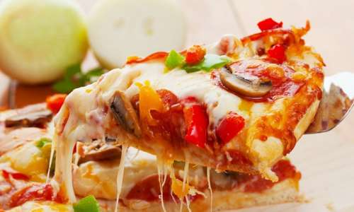 Pizza, Wings, and More at Pauly's Pizzeria - South Loop (Up to 42% Off). Two Options Available.